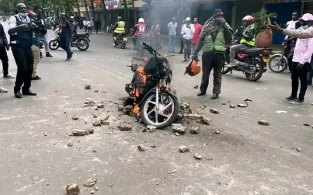 Motorcycle torched, rider clobbered as protesters clash with goons in Nairobi CBD