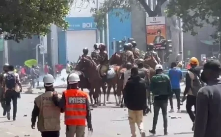 Defiant protesters press on as more police officers deployed