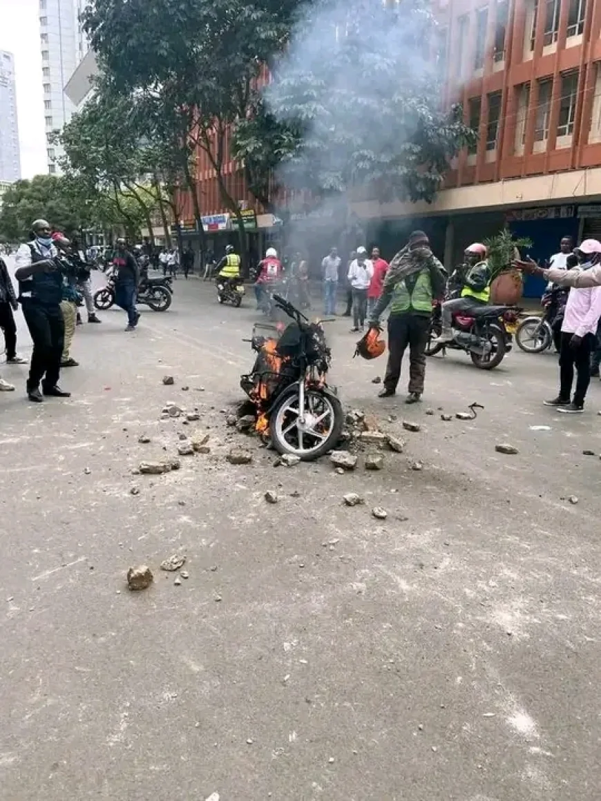 Motorcycle torched, rider clobbered as protesters clash with goons in Nairobi CBD